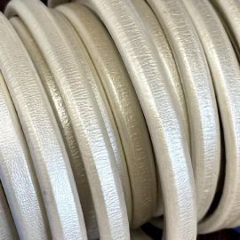 Cuir ovale regaliz ivoire metal par 20cm