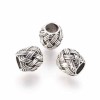 5 perles tibetaines ciselees tressees argentees pour cuir 5mm