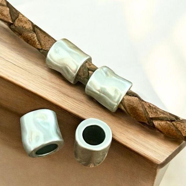 2 perles tube martelees argent pour cuir 4mm