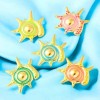 Pendentif soleil emaille acier inoxydable dore 29mm
