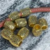 10 perles ciselees ethniques baril tibetain dore antique interieur 4mm