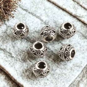 5 perles tibetaines ciselees vagues argentees pour cuir 4mm