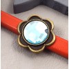 passe cuir verre turquoise et metal bronze  27mm pour cuir regaliz