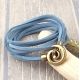 Kit bracelet cordon suedine noire bleu jean fermoir spirale bronze