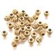 50 perles tibetaines sculptées doré vieilli pour cuir 2mm