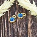 Pendentif rond dore cabochon cristal swarovski 7mm