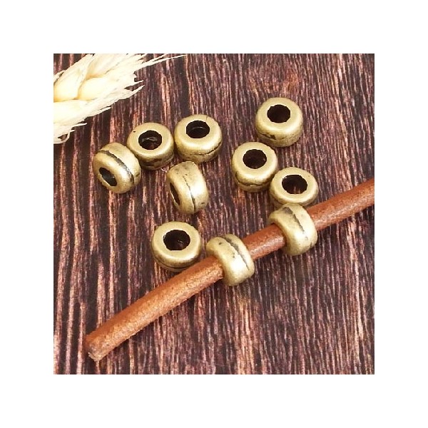 10 perles rondelles rustiques bronze pour cuir 4mm