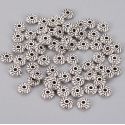 50 perles tibetaines rondelles rosaces argentees pour cuir 1mm